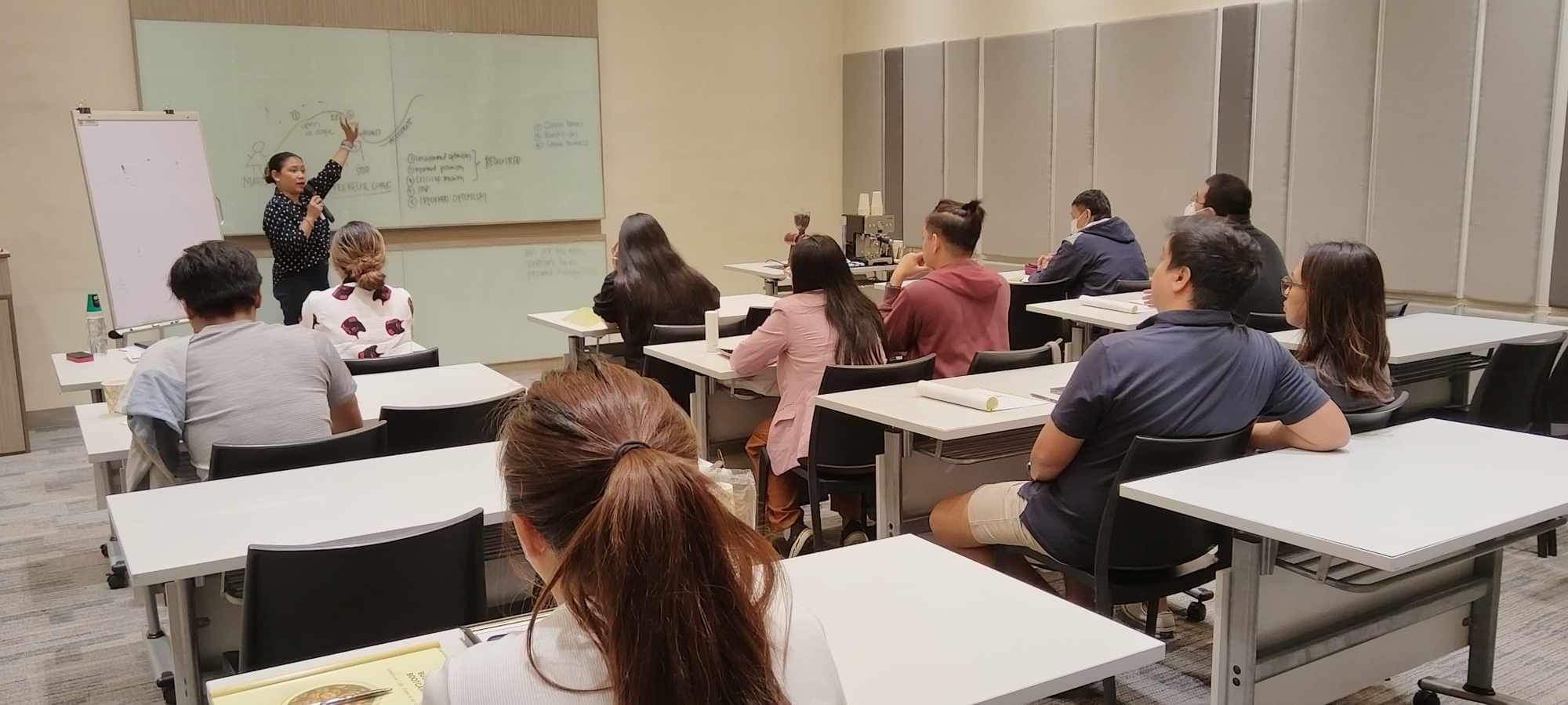 A business session in progress across the training room