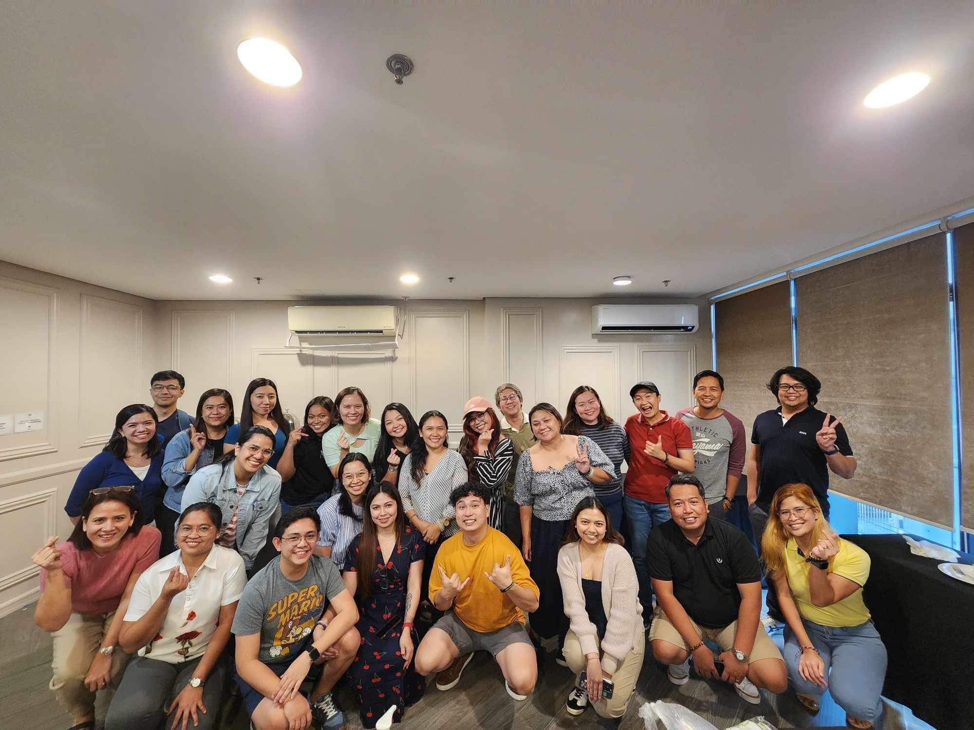 A full class photographed together at the end of a program